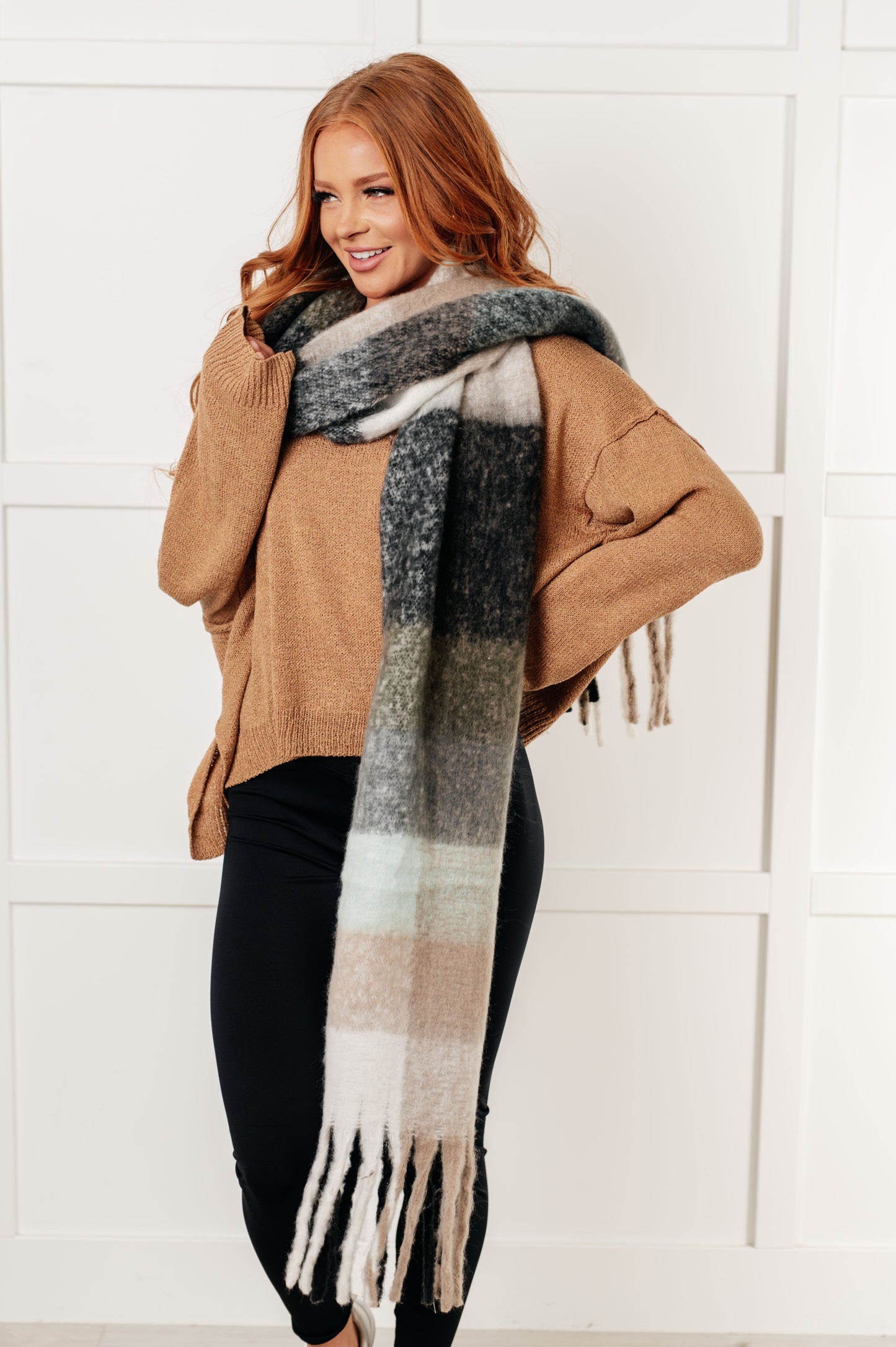 Women's oversized plaid fringe scarf in gray and jade.