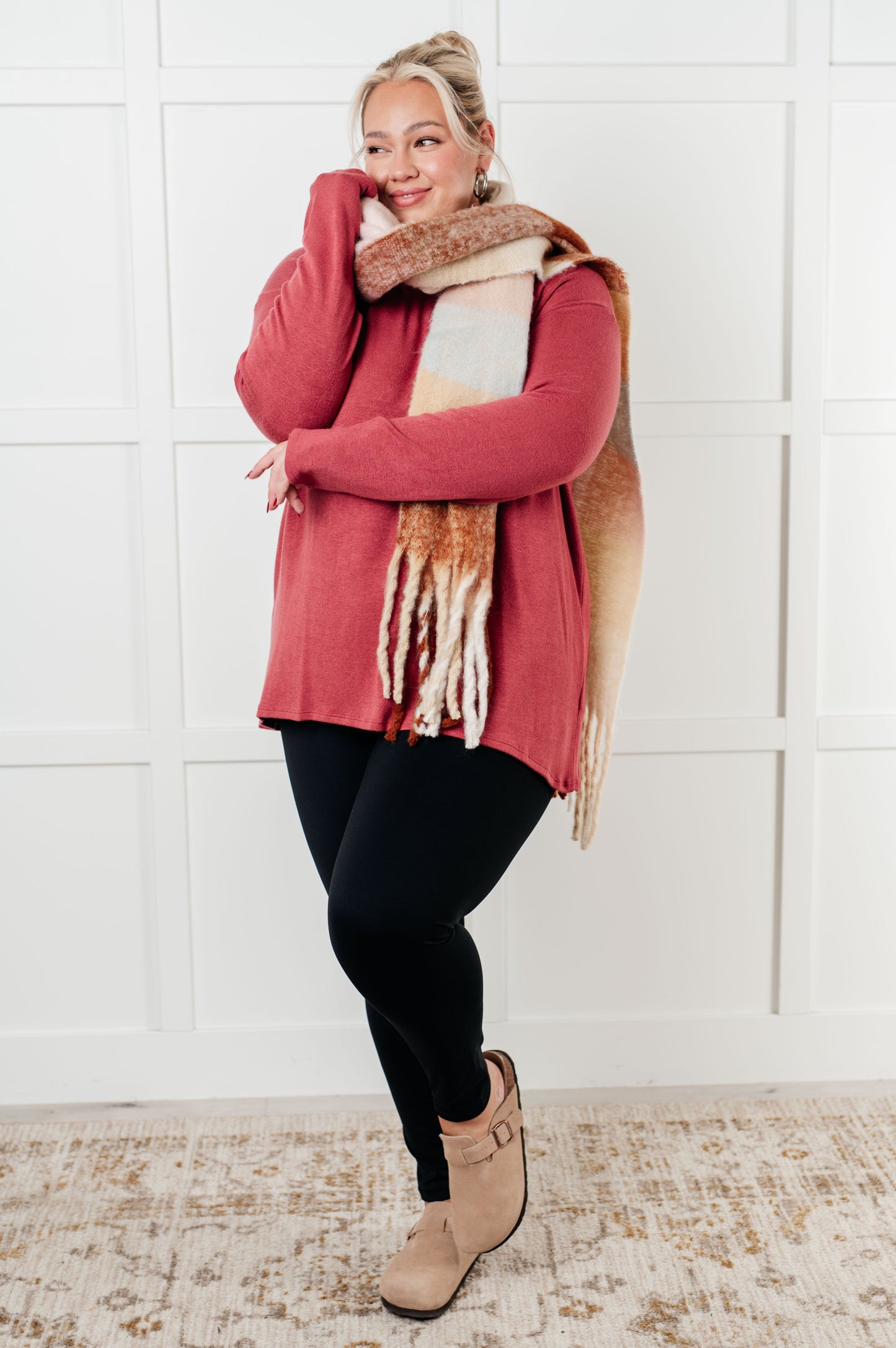 Women's oversized plaid fringe scarf in light brown.