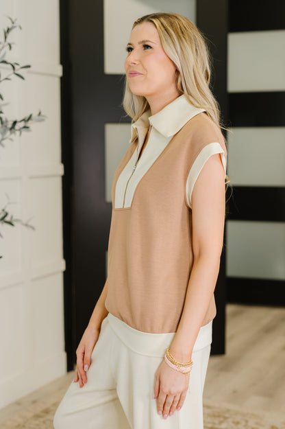 Side profile of Jovie Color Block Half Zip Top highlighting scuba knit fabric and half zip neckline.