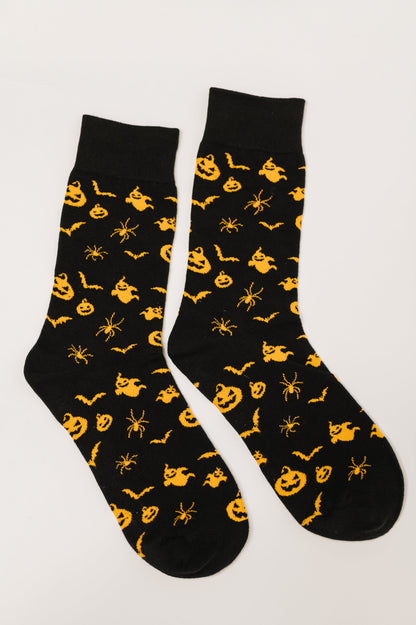 Flat lay of Wicked Walk Quarter Socks with pumpkin, bat, ghost, and spider print
