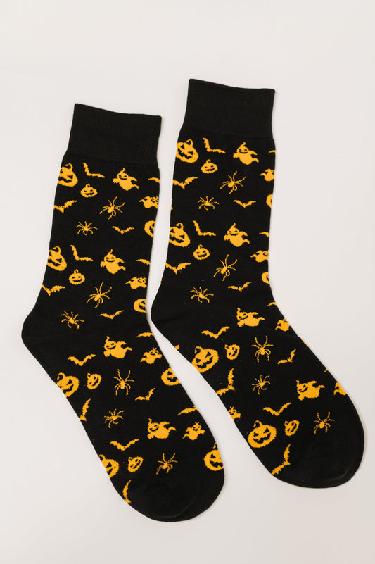Flat lay of Wicked Walk Quarter Socks with pumpkin, bat, ghost, and spider print