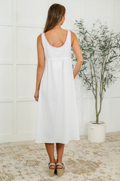 Back view of the Wiley Petals Scoop Neck Dress – lightweight and flowy off-white dress perfect for spring and summer outfits.