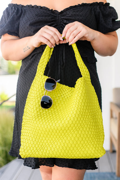 Women's tote bag purse in vibrant citron color with a basket weave pattern, made of PU vegan leather. Includes a matching zippered clutch and features a magnetic closure.