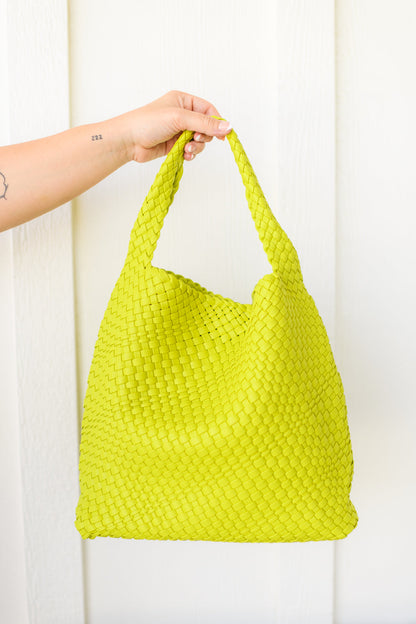 Women's tote bag purse in vibrant citron color with a basket weave pattern, made of PU vegan leather. Includes a matching zippered clutch and features a magnetic closure.