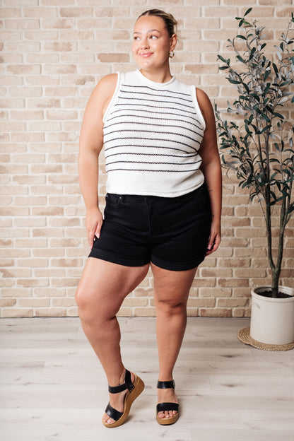 Plus size Yarely striped knit tank featuring a halter fit, ribbed neckline, and flattering ribbed hemline.