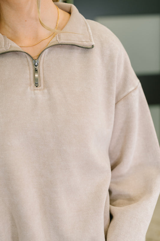 Close-up of silver zip and fleece fabric on Sutton Half Zip Pullover
