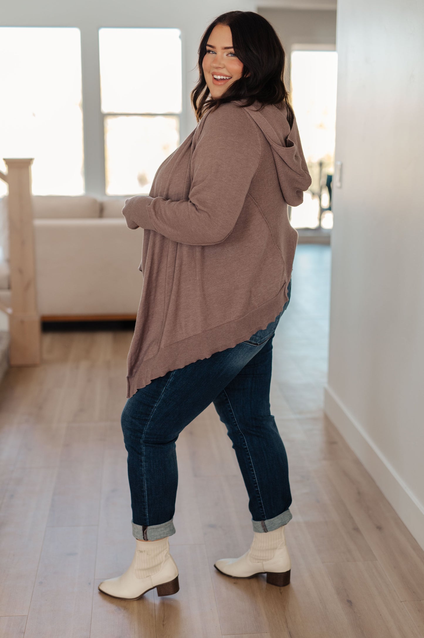 Plus size side full body view of mocha Lucy Hooded Cardigan with ribbed accents and button closure