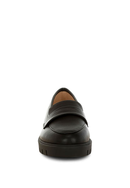 Peridot Chunky Loafers in black showing clean lines and timeless loafer profile.
