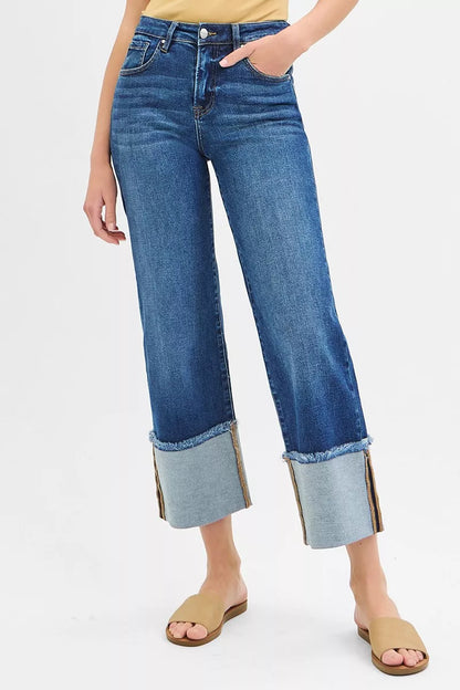 Front view of size inclusive Desi Mid Rise Crop Wide Cuffed Jeans with wide leg silhouette.