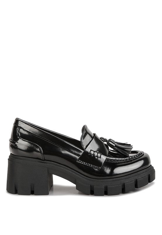 Side angle view of Jonah Platform Loafers in black showing chunky platform sole