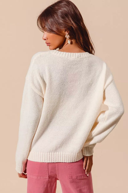 Back view of Gina Heart Cherry Knitted Sweater Top showing cozy ivory knit.