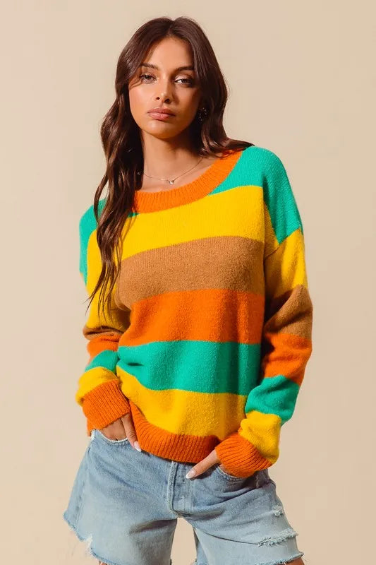 Full body outfit with Sunny Multi Color Stripe Sweater styled with jeans, ribbed texture visible.