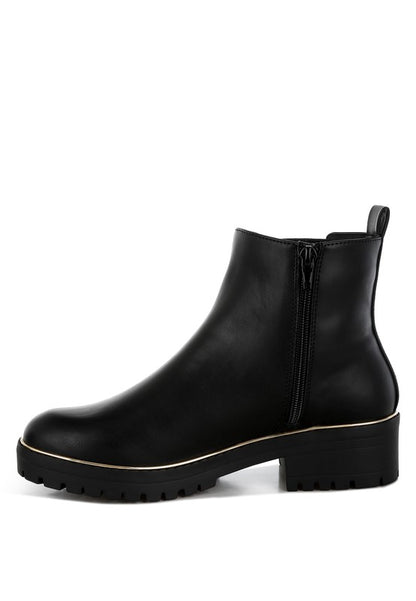 Inside side view of black Antorin chunky buckle ankle boots highlighting zipper and gusset.