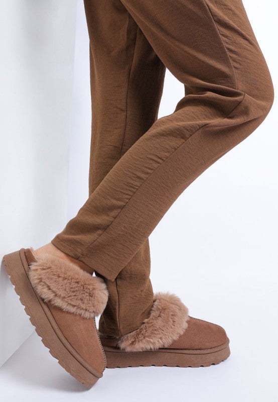 Side view of Brown Portho Faux Fur Slip Ons showing microfiber upper and slip-on fit.