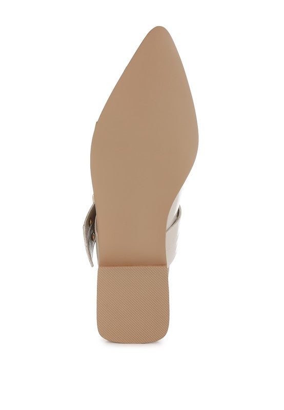 Beige flats with a pointed toe, adjustable buckle straps, eyelet detailing, and a slingback design. Features a cushioned insole and 1-inch flat heel for comfort.