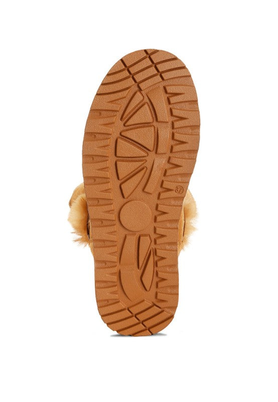 Sole view of Tan Noaya Chunky Faux Fur Snow Boots showing traction.