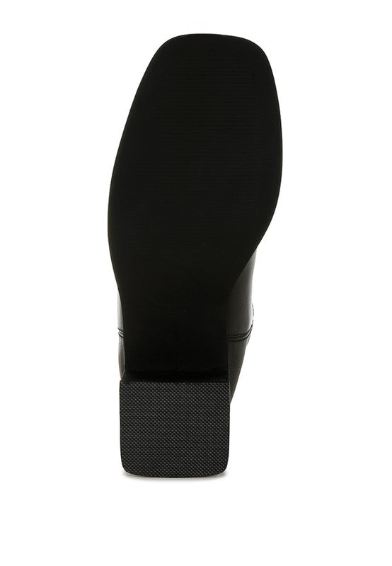 Sole of Iliad Leather Ankle Boots with textured tread and stacked heel base.