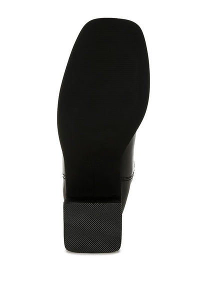 Sole of Iliad Leather Ankle Boots with textured tread and stacked heel base.