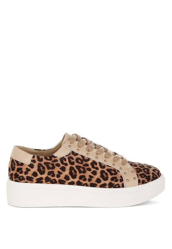 Outside angle of beige leopard print sneakers highlighting chunky heel and soft cushion insole.
