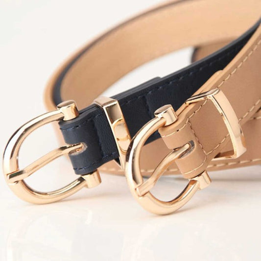 Tally Vegan Leather Belts in black and tan with gold buckles, styled side by side
