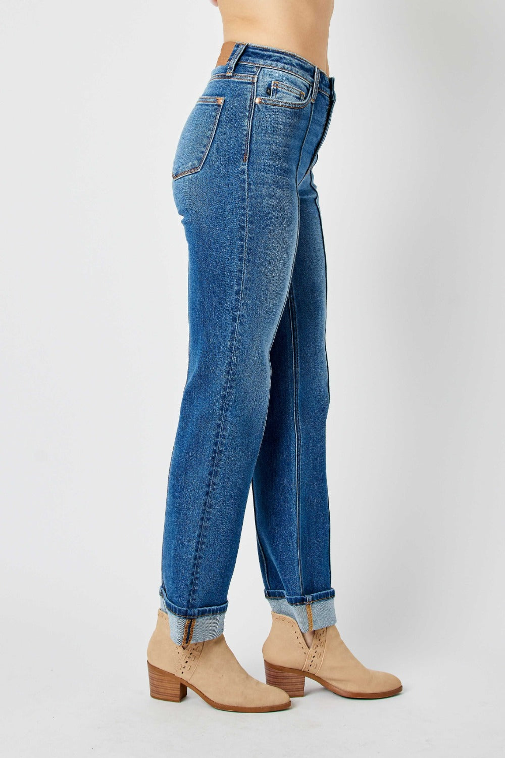 Medium wash high-waist straight-leg jeans with front seam detail and moderate stretch.