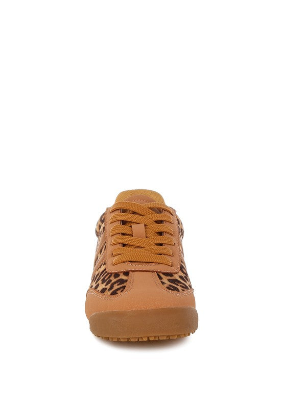 Front view leopard print sneakers with round closed toe design