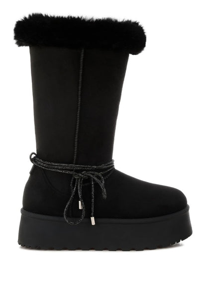 Black boots lateral side view with round toe and textured microfiber finish.