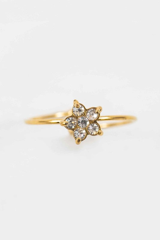 Stella Adjustable Star Ring top view showing gold band and star charm with five stones