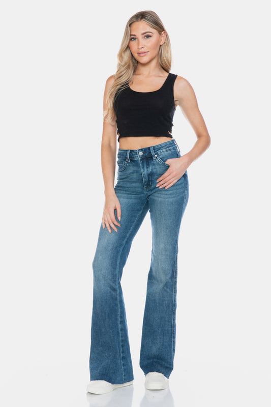 Tummy Control Cut Hem Flare Jeans by Judy Blue in medium vintage wash, featuring a high waist, tummy control, cut hem detail, and moderate stretch for a flattering silhouette.