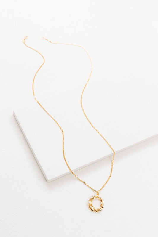 Flat lay showing full length of Charming Circle Necklace in Gold