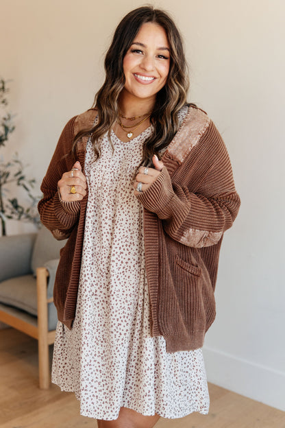 Plus size model wearing Talia Grandpa Cardigan in brown mineral wash with open front design.