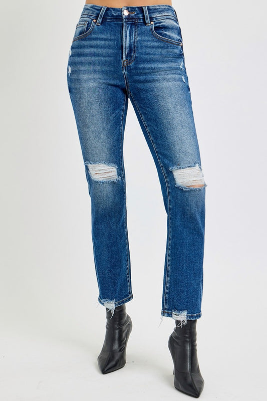 High Rise Distressed Crop Straight Jeans in dark wash with a high-rise fit, distressed details, raw hem, and slightly stretchy fabric for a cool, versatile look.