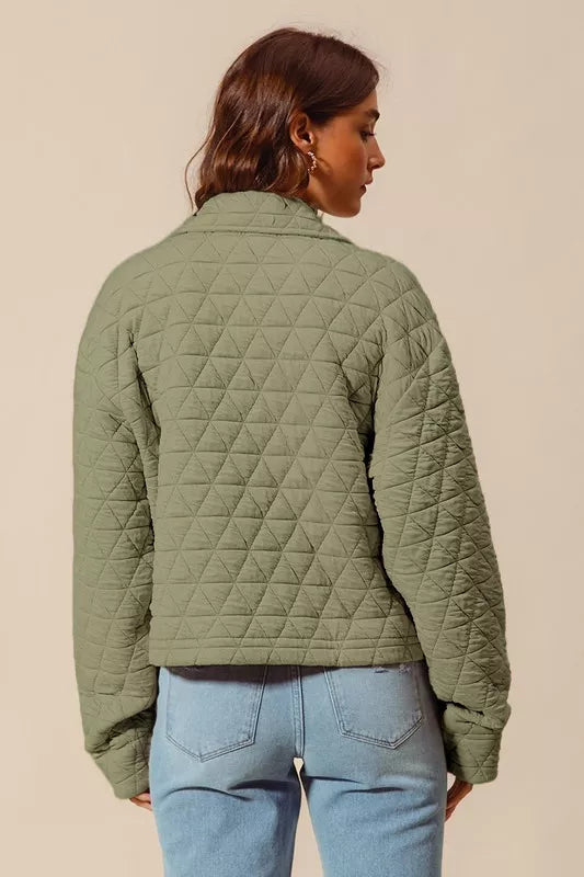 Back view of Serina Quilted Snap Jacket displaying quilted stitching and relaxed fit.