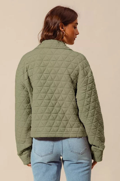 Back view of Serina Quilted Snap Jacket displaying quilted stitching and relaxed fit.