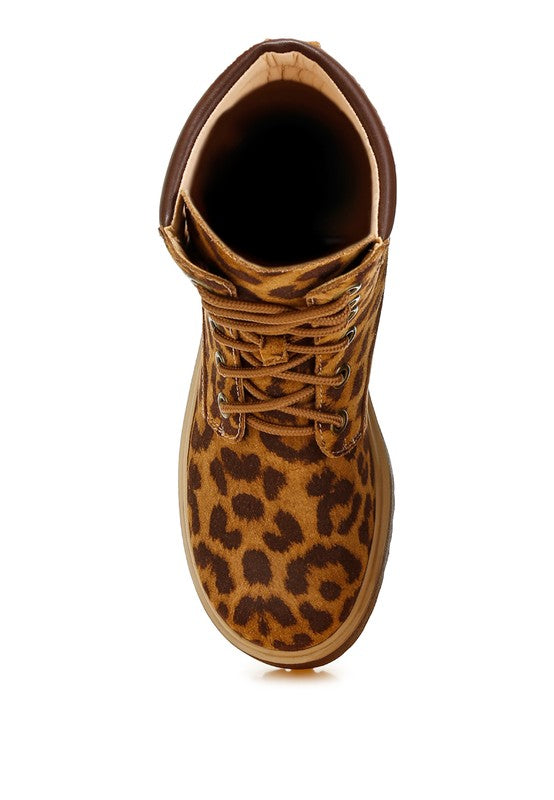 Leopard print high-ankle suede boots with a quilted collar, lace-up design, round closed toe, and low block platform heel. Features cushioned insoles and a durable lug sole.