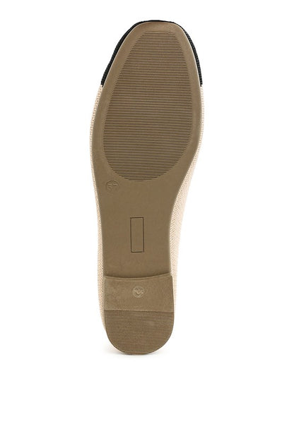Bottom sole view of Rosario Two Tone Ballerinas in beige and black with textured TPR outsole