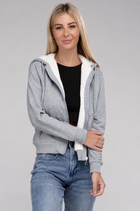 Heather Grey cropped zip-up hoodie with fuzzy trim, pockets, and long sleeves.