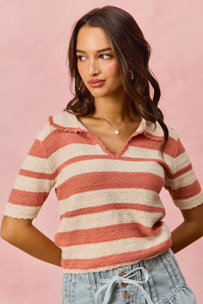 Model adjusting Noreen Stripe Short Sleeve Cropped Sweater showing short sleeves.