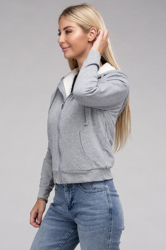 Heather Grey cropped zip-up hoodie with fuzzy trim, pockets, and long sleeves.