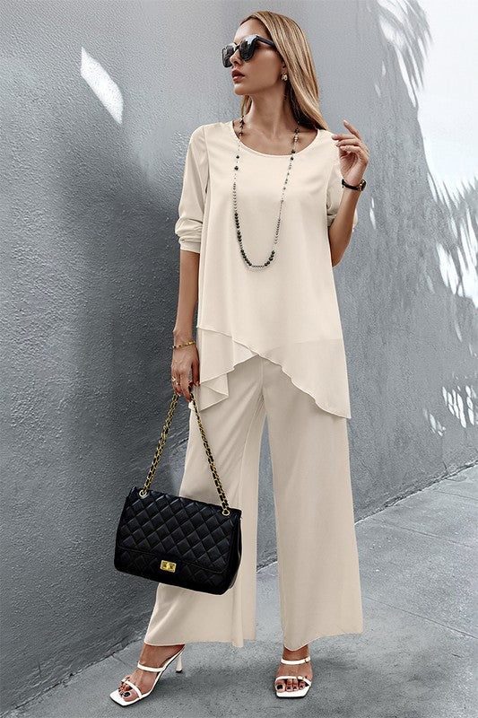 Front view of Nikita Two Piece Set in crème showing round neck and layered top