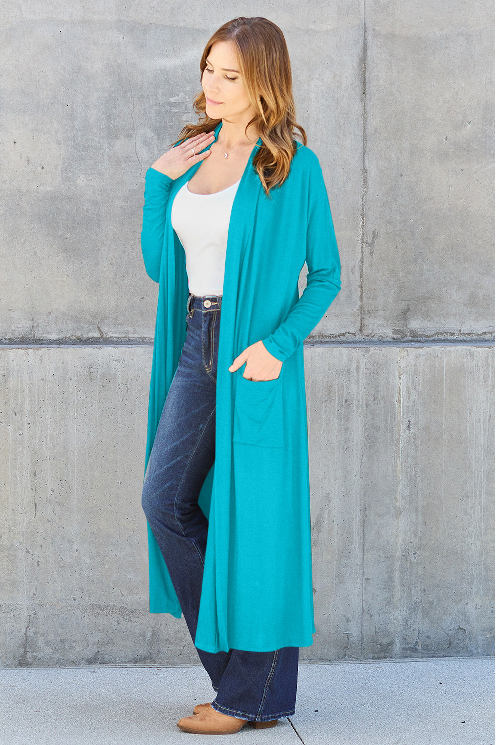 Sky Blue open-front long-sleeve cover-up with a flowy design and pockets, perfect for layering on breezy days.