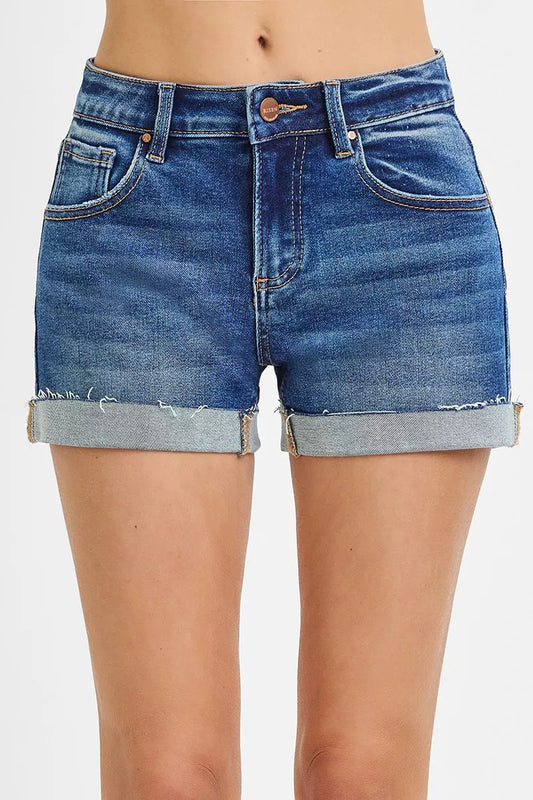 Zayla RISEN dark wash cuffed shorts close-up with rolled raw hem and stretch denim