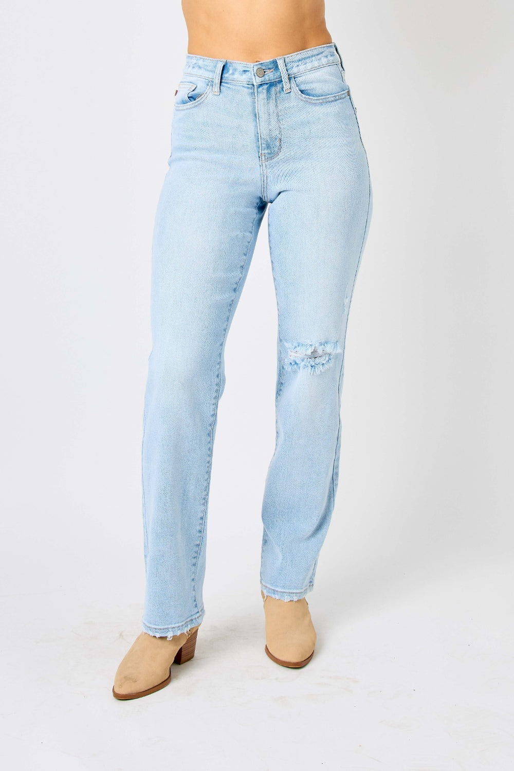 High waist distressed straight jeans in light wash. Slightly stretchy with a zip fly closure.