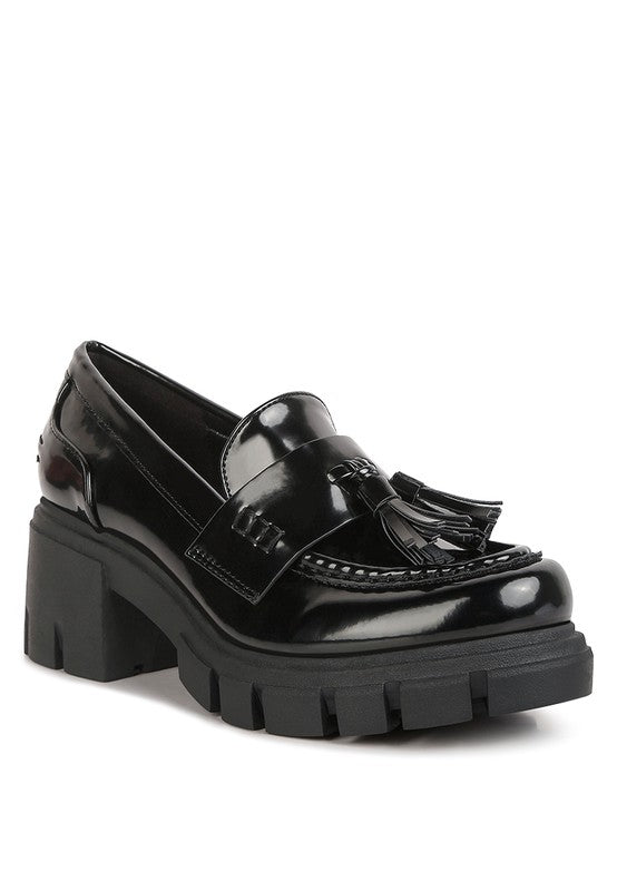 Front angle view of Jonah Platform Loafers in black with tassel detail