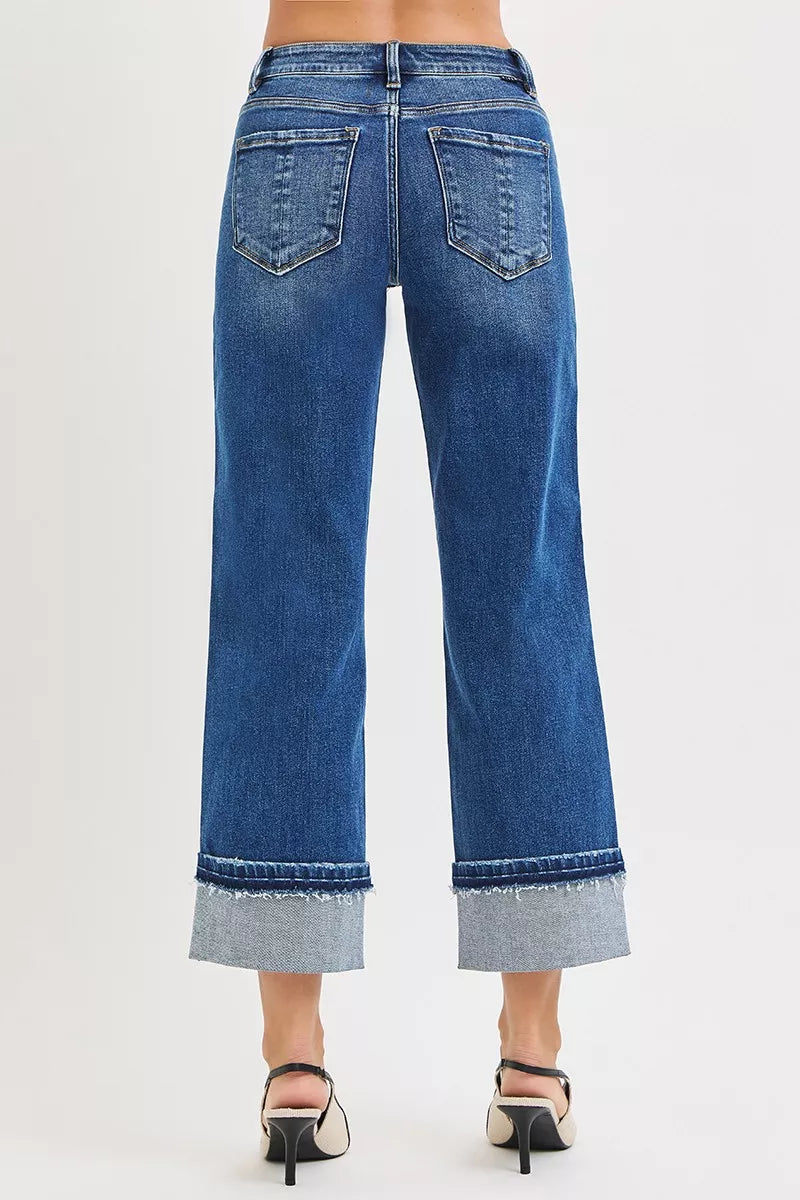 Back of Vera Mid Rise Straight Jeans with pockets and cuffed hem.