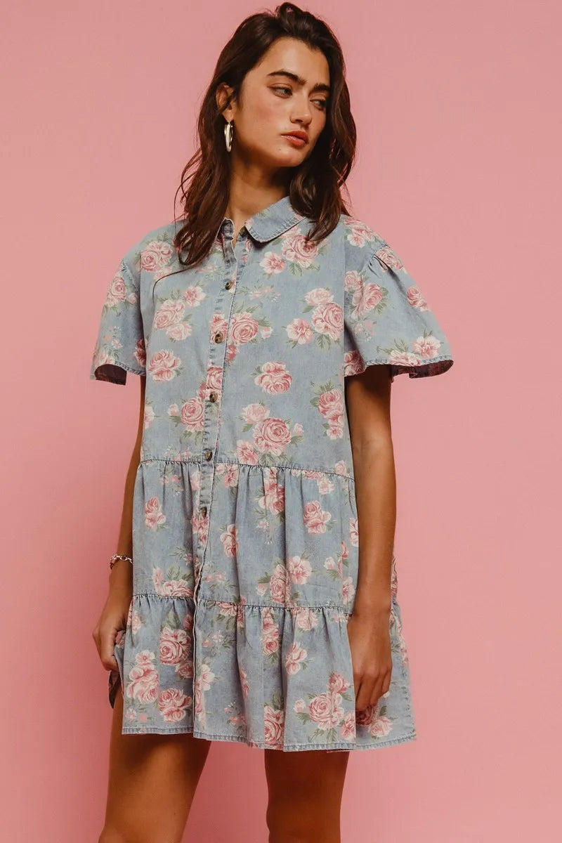 Front view of Isla Floral Tiered Shirt Dress by BiBi, highlighting flared short sleeves and soft floral pattern on lightweight denim cotton.