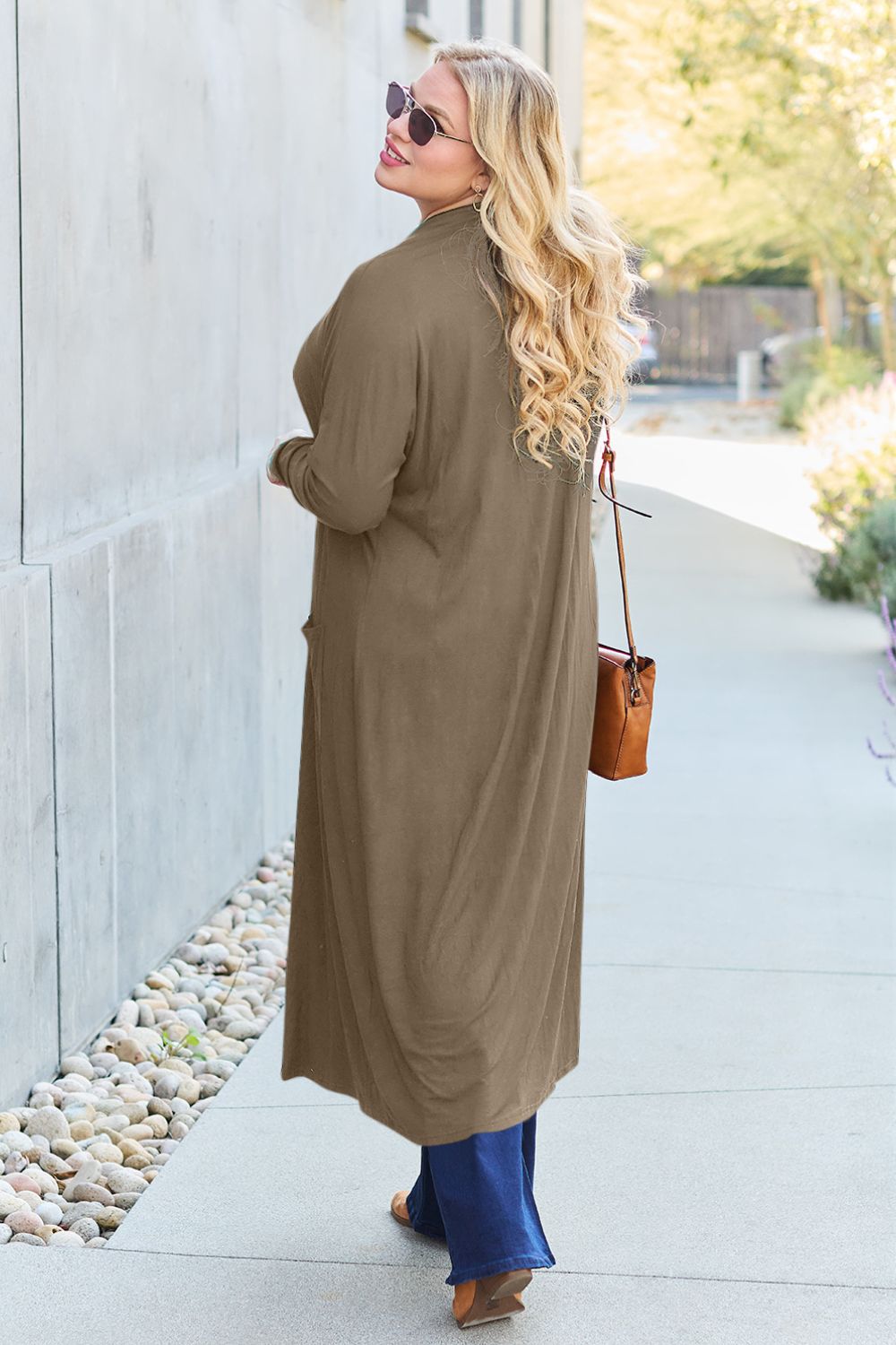 Chestnut open-front long-sleeve cover-up with a flowy design and pockets, perfect for layering on breezy days.