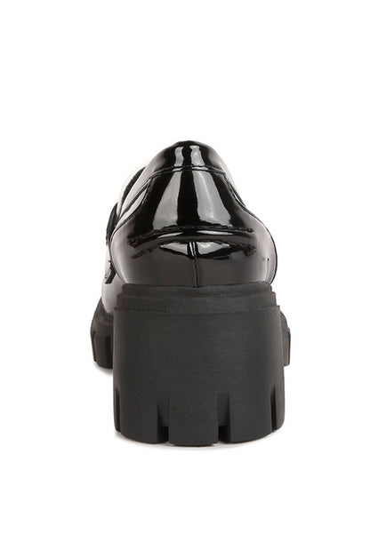 Back view of Jonah Platform Loafers in black with block heel construction