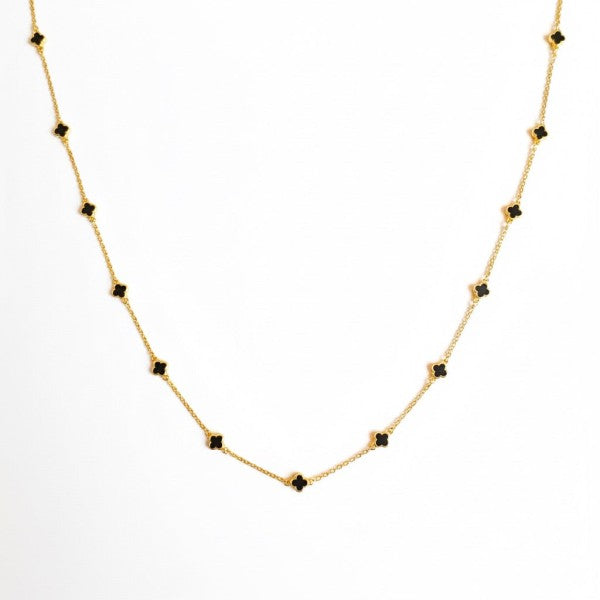 Petite Colored Clover Necklace in black, perfect for layering.