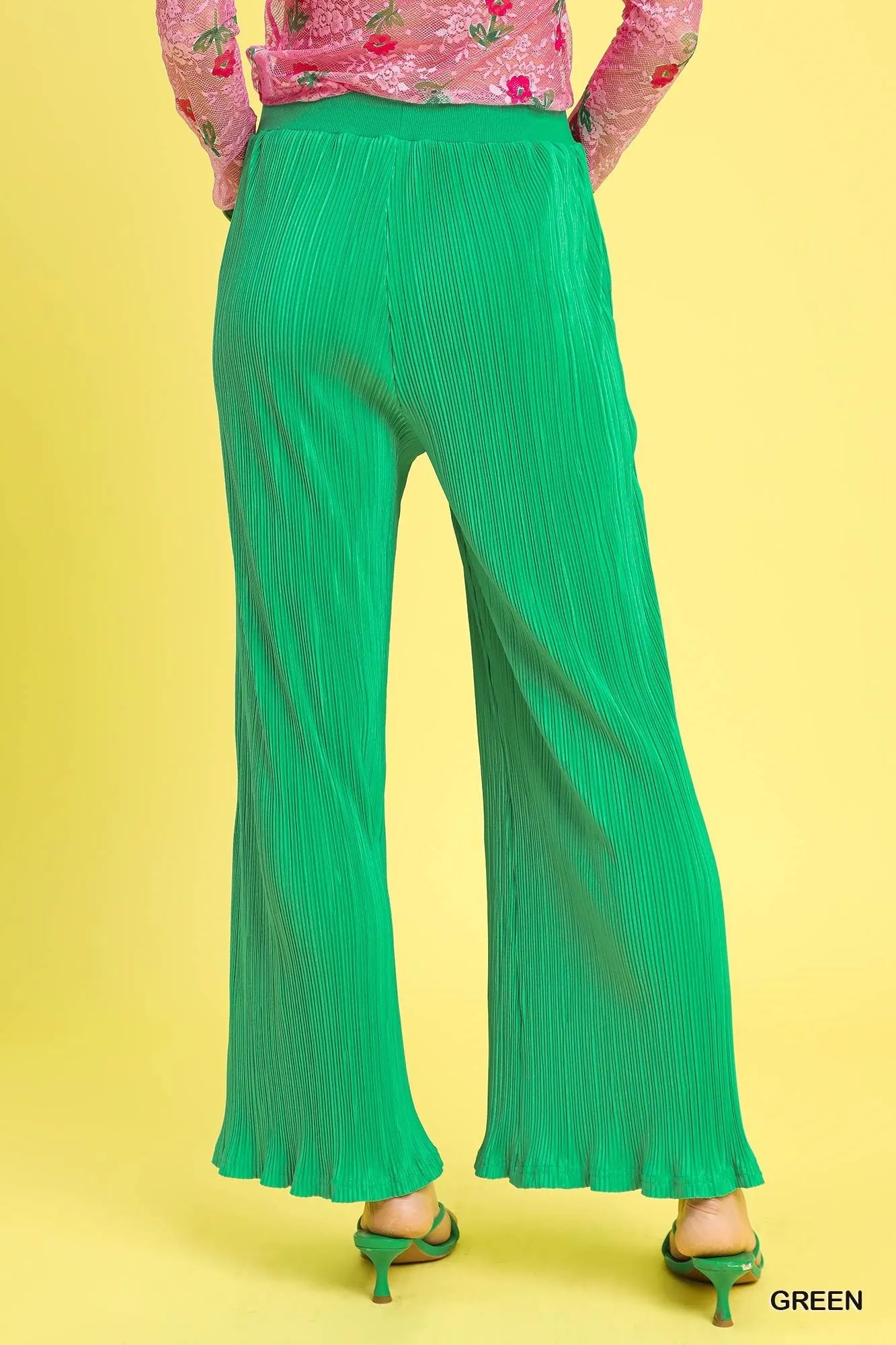 Back view of Hadlee Pants in green with wide-leg, ankle-length silhouette.